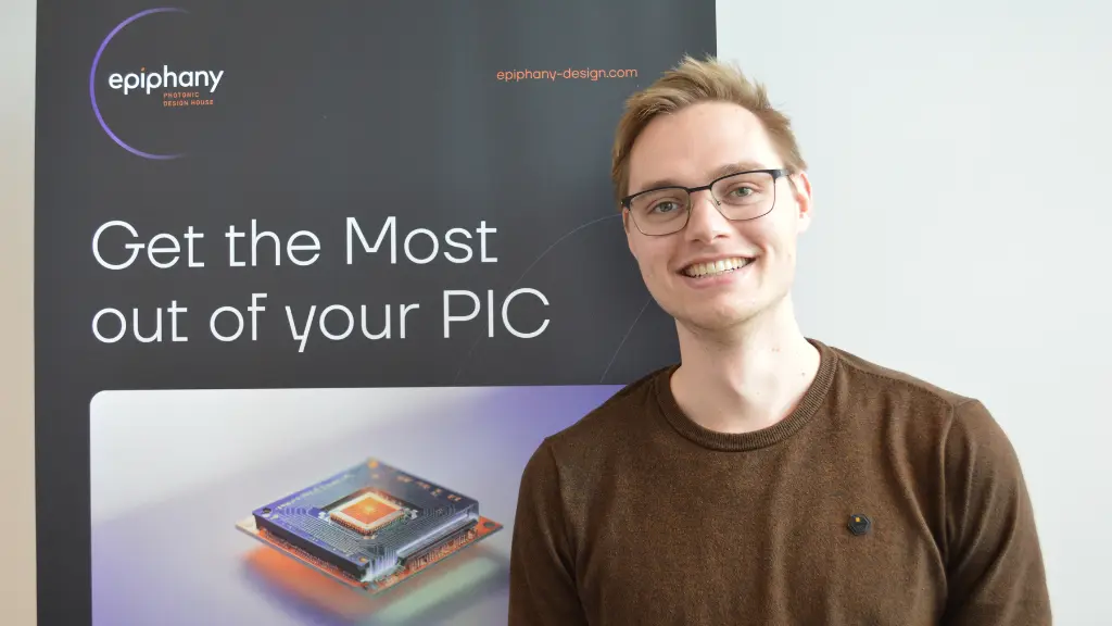 Hessel van der Vegt next to Epiphany roll-up banner